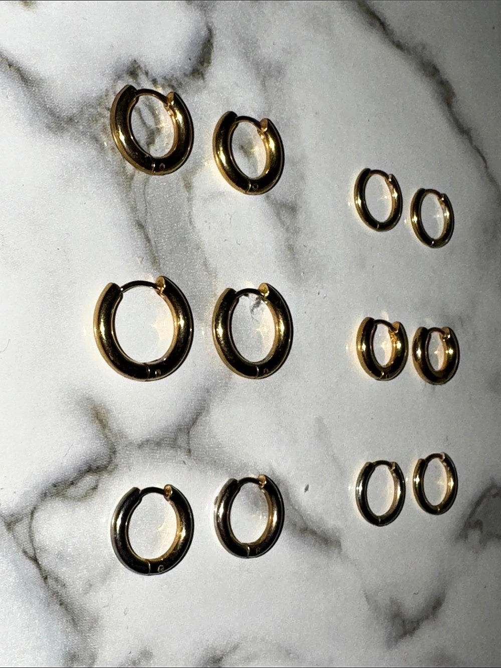 8 Pairs of Gold-Tone Hoop Earrings Sets